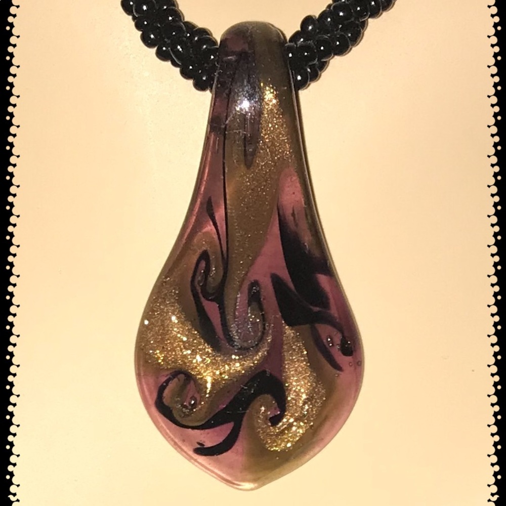 Black beaded necklace with brown glass bead